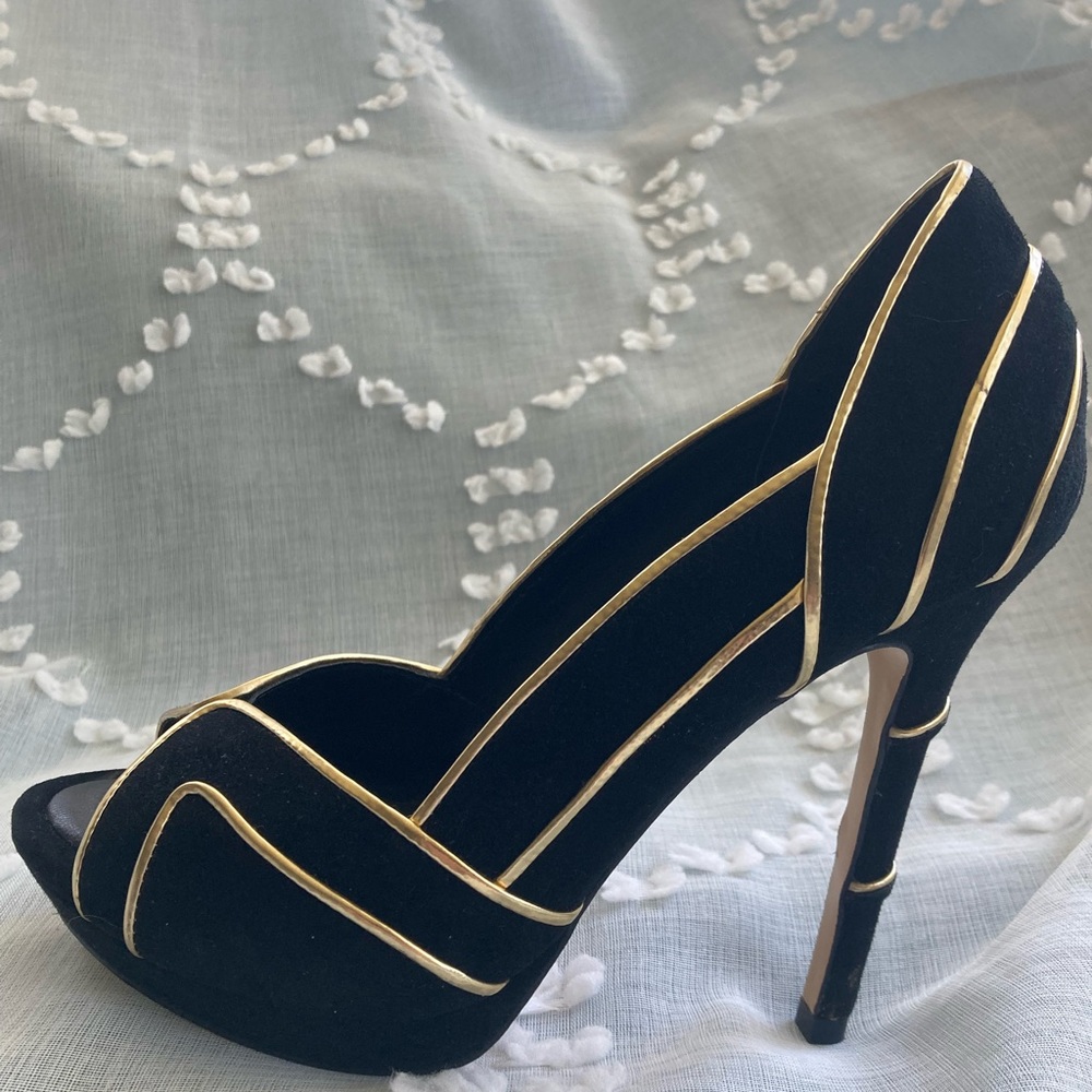 BCBG black velvet 4 1/2” heel with gold accents.